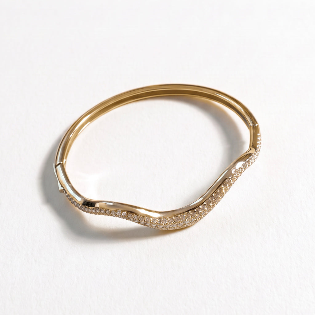 Bracciale Onda Luce, finitura dorata — foto prodotto