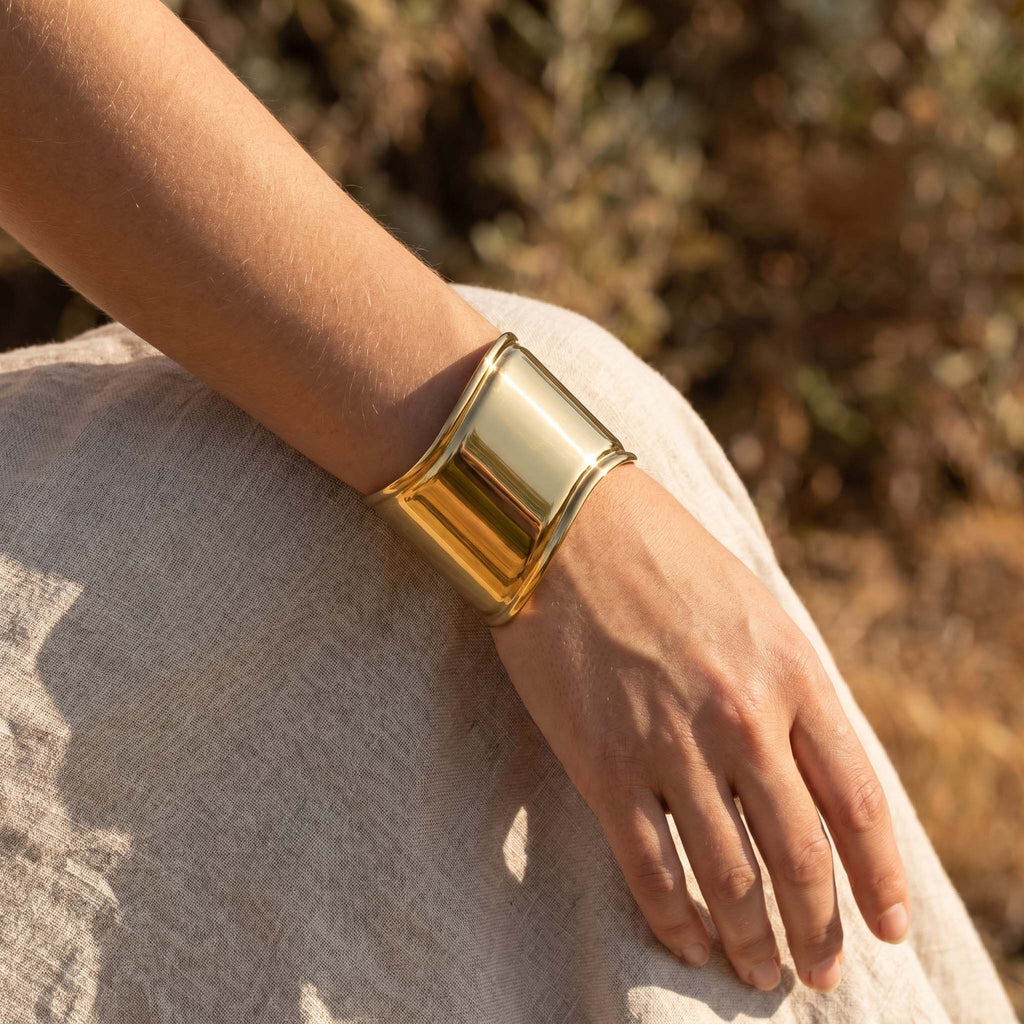 Bracciale cielo oro indossato