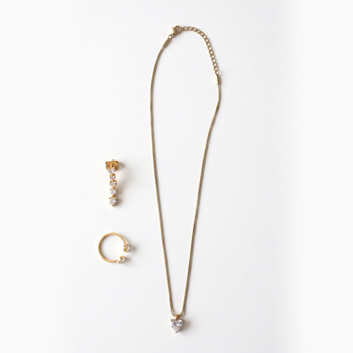 Parure Battito: collana, anello e orecchini con cuori in zirconi